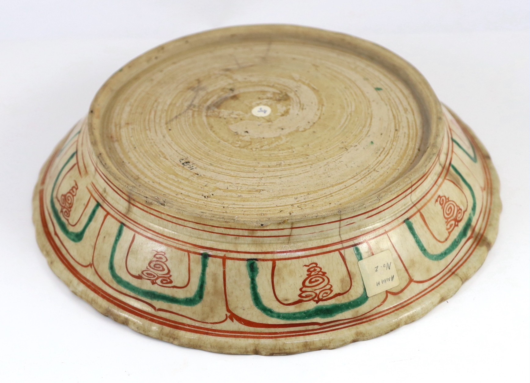 An Annamese polychrome ‘bird’ dish, 15th-16th century, 34.5cm diameter, stained and with cracks